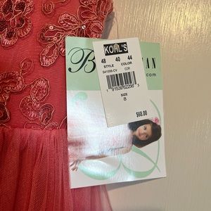 Girls new with tags dress with shorts! Size 8.